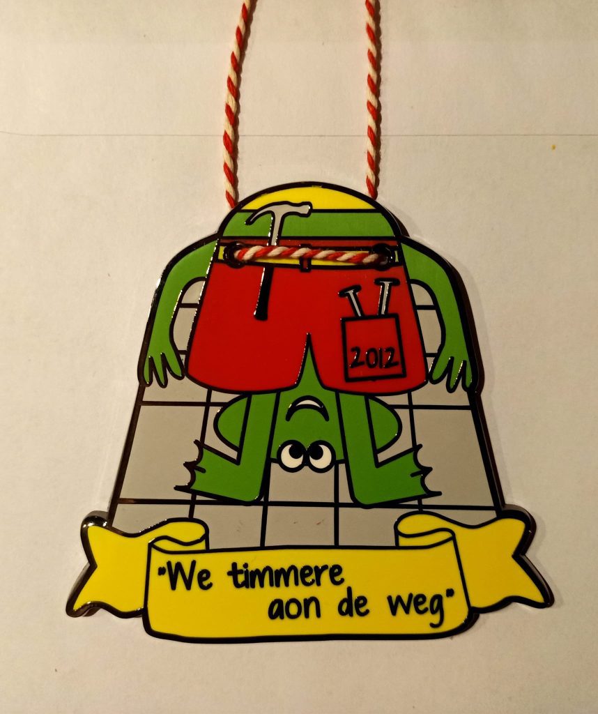 SKCH insigne 2012 'We timmere aon de weg'